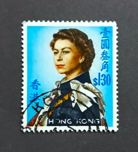 Issue:   Hong Kong 1962 Queen Elizabeth II Stamp Type:   Stamp Number of Stamps:   1 Denominations:   1.30 $ Issue Date:   1962 Issued By:    Hong Kong Post