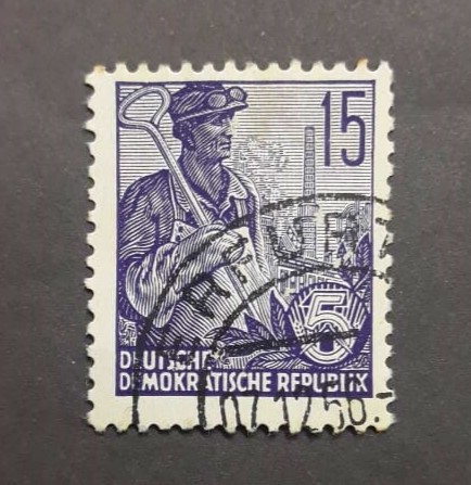 Issue:  Germany 1955 Five Year Plan Stamp Type:   Stamp Number of Stamps:   1 Denominations:   15 PF Issue Date:   1955 Issued By:   Germany Deutsche Post ( Deutschland )