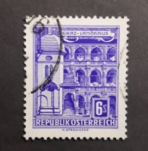 A variation of the Mauritius "Post Office" stamps, featuring the correct inscription "Post Paid." It is considered rare and valuable.