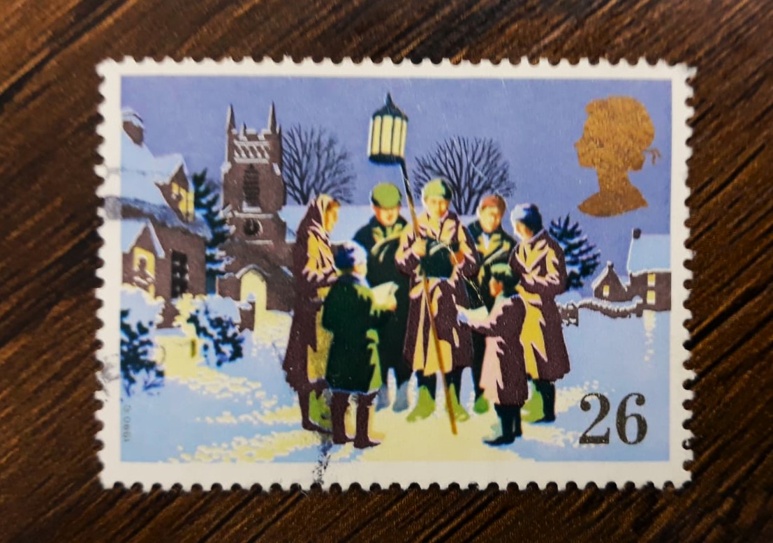 Issue:    UK 1990 Carol Singing Stamp Type:   Stamp Number of Stamps:   1 Stamps Denomination:   26 P Issue Date:   1990 Issued By:   Royal Mail, United Kingdom