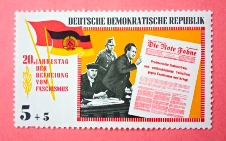 Issue:   Germany 1965 The Red Flag Stamp Type:   Stamp Number of Stamps:   1 Denominations:   5+5  Issue Date:   1965 Issued By:   Germany Deutsche Post ( Deutschland )
