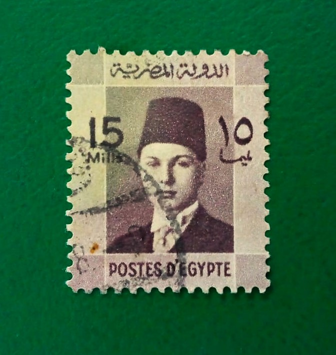 Issue:     Egypt King Farouk 1937 Stamp Type:     Stamp Number of Stamps:      1 Stamps Denomination:      15 M Issue Date:      1937 Issued By:     Egypt Post