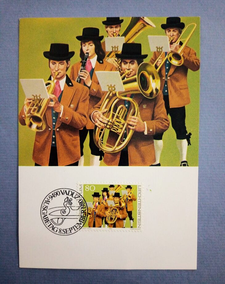Issue:     Liechtenstein 1980 Music Folk Costumes postcard Type:     Postcard Number of Stamps:     1 Stamps Denomination:     80 Rp, Issue Date:     1980 Issued By:    Europe Post 