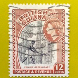 Issue:          British Guiana (Guyana) Felling Greenheart 1954 Stamp Type:        Stamp Number of Stamps:        1 Stamps Denomination:         12 c, Issue Date:         1954 Issued By:       British Guiana (British Colony, now Guyana)